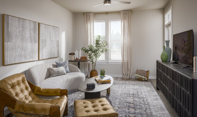 a living room with a couch and a table