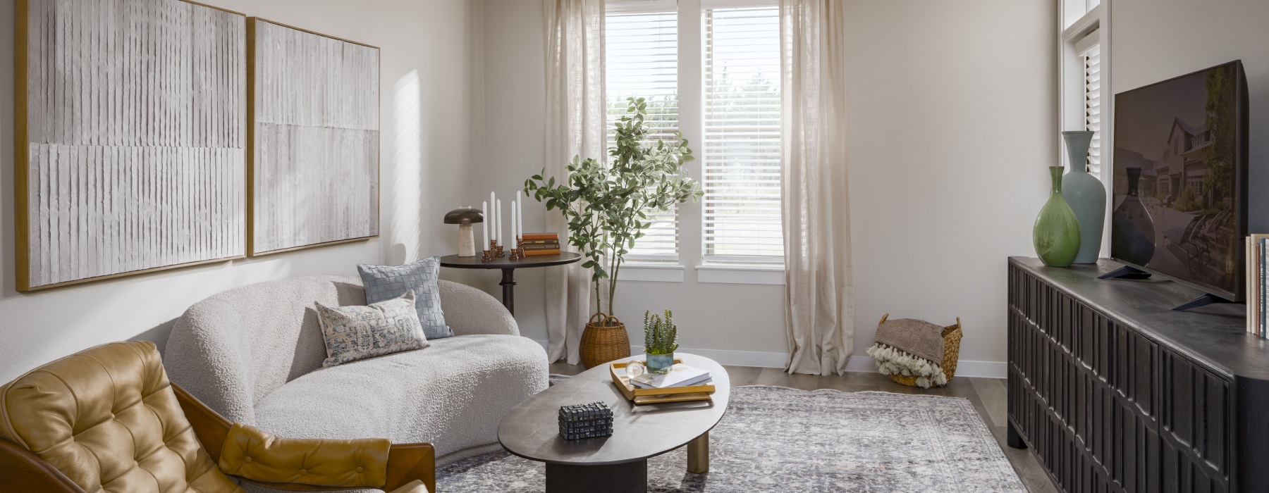 a living room with a couch and a table