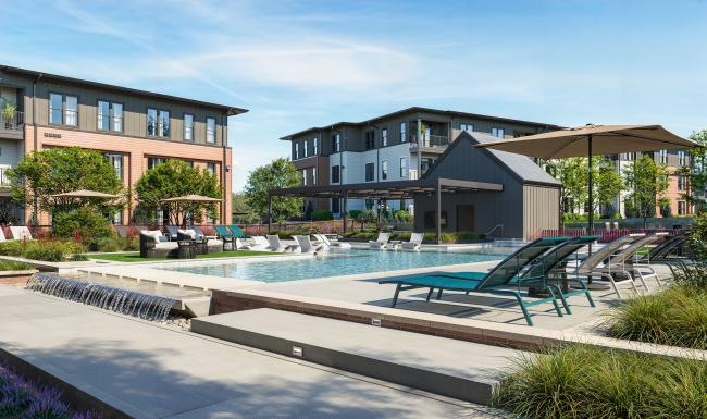 a swimming pool in a courtyard and chairs