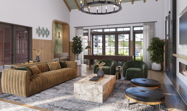 a spacious room with a large chandelier and a couch