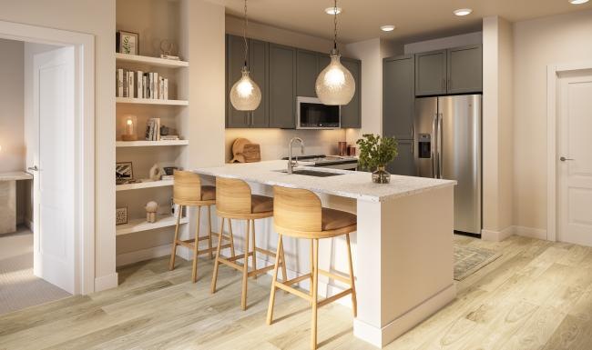 a kitchen with an island, bar stools and a table