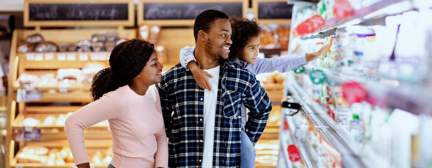 a group of people in a grocery store